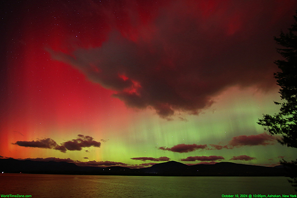 Aurora Borealis show during G3 severe Geomagnetic Storm on Oct 10, 2024 - Northern Lights due a powerful X-class solar flare - travel world time zones worldtimezone world time zone photo Alexander Krivenyshev WorldTimeZone